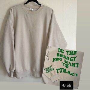 Green Motivational Graphic Cream Sweatshirt "Be the energy you want to attract."